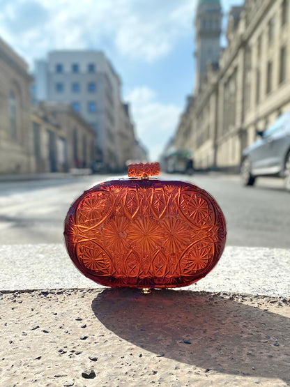 Hand Carved Oval Clutch Amber